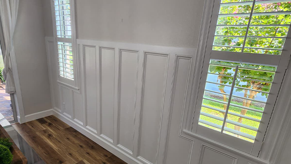 Detailed window trim installations for a refined interior finish.